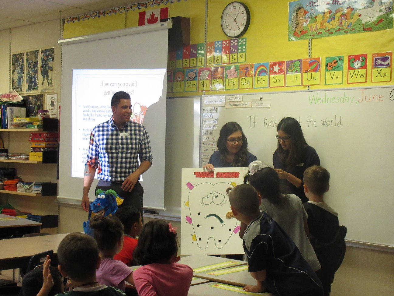 Dr. Himmat Bajwa presenting at elementary school